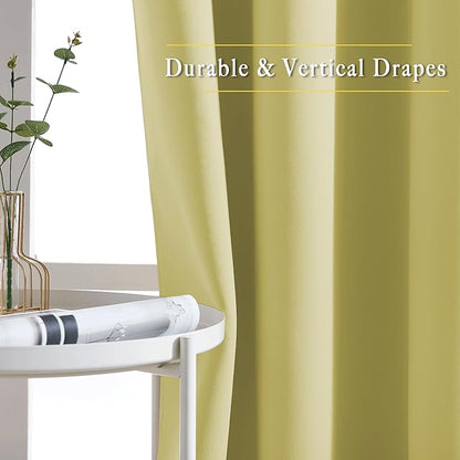 NICETOWN Room Darkening Curtain Panels Grommet - Home Decorations Thermal Insulated Solid Grommet Top Room Darkening Living Room Drapes (Paler Yellow, 1 Pair, 52 x 72-Inch)